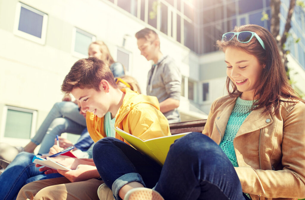 IELTS Preparation in Hua Hin – Study and Stay at The Palm Residence 1 IELTS Preparation in Hua Hin students studying outdoors at The Palm Residence.