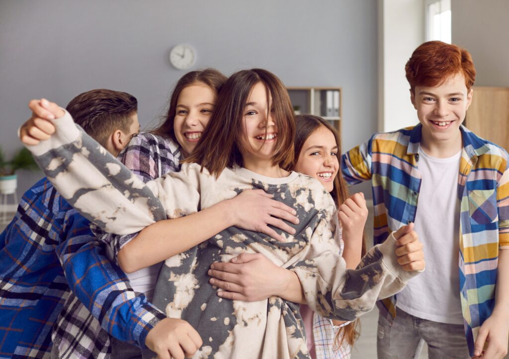 Student Residence in Thailand 1 Students smiling and enjoying time together inside a student residence in Thailand.